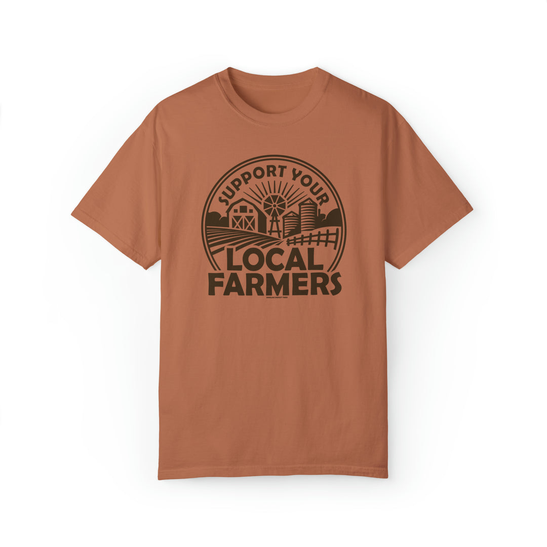 Alt text: Support Your Local Farmer Tee: Brown t-shirt featuring a farm logo, made of 80% ring-spun cotton and 20% polyester. Unisex, relaxed fit with rolled-forward shoulder and back neck patch.