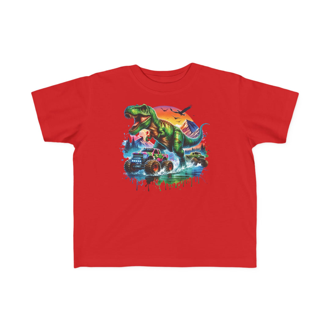 Dino Truck Toddler Tee featuring a colorful graphic of a T. rex and monster trucks in a sunset scene, designed for toddlers' comfort and adventure.
