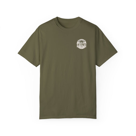 A green Raise Um Right Tee, featuring a deer and trees logo on ring-spun cotton. Garment-dyed for extra coziness, with a relaxed fit and durable double-needle stitching. Ideal for daily wear.