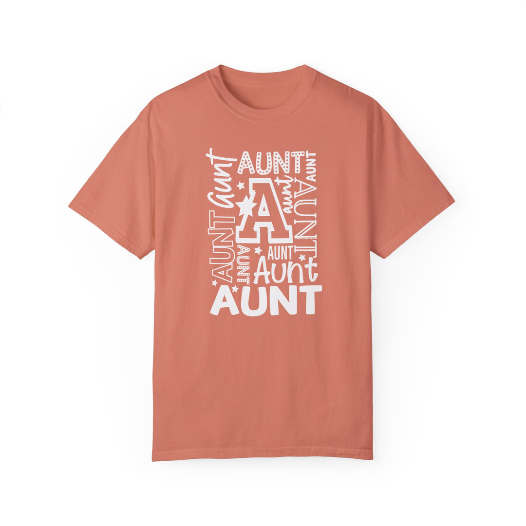 Aunt Tee: Garment-dyed, ring-spun cotton t-shirt with a relaxed fit. Soft-washed fabric for coziness, double-needle stitching for durability, and no side-seams for a tubular shape. Medium weight.