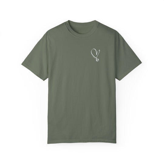 A green t-shirt featuring a heart and needle design, the I am Beautiful Tee from Worlds Worst Tees. Made of 100% ring-spun cotton, garment-dyed for coziness, with double-needle stitching for durability.