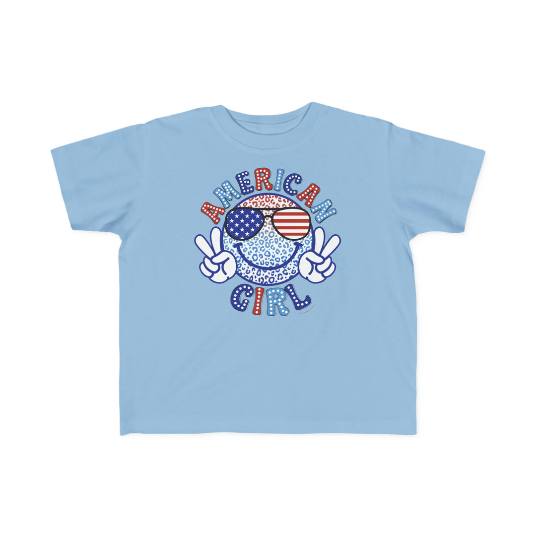 American Girl Toddler Tee featuring a peace sign, smiley face, and sunglasses. Soft 100% cotton, light fabric, classic fit, tear-away label. Available in sizes 2T to 5-6T.