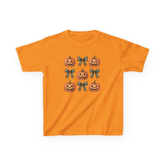 Jack and Bow Kids Tee features a 3x3 grid of jack-o’-lanterns and dark bows on an orange cotton shirt, offering durable, everyday wear.