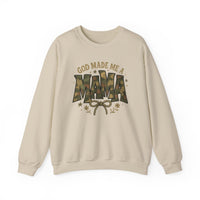 Cream-colored crewneck sweatshirt with GOD MADE ME A MAMA graphic; MAMA in camouflage pattern, accented by a bow, stars, and floral sprigs.