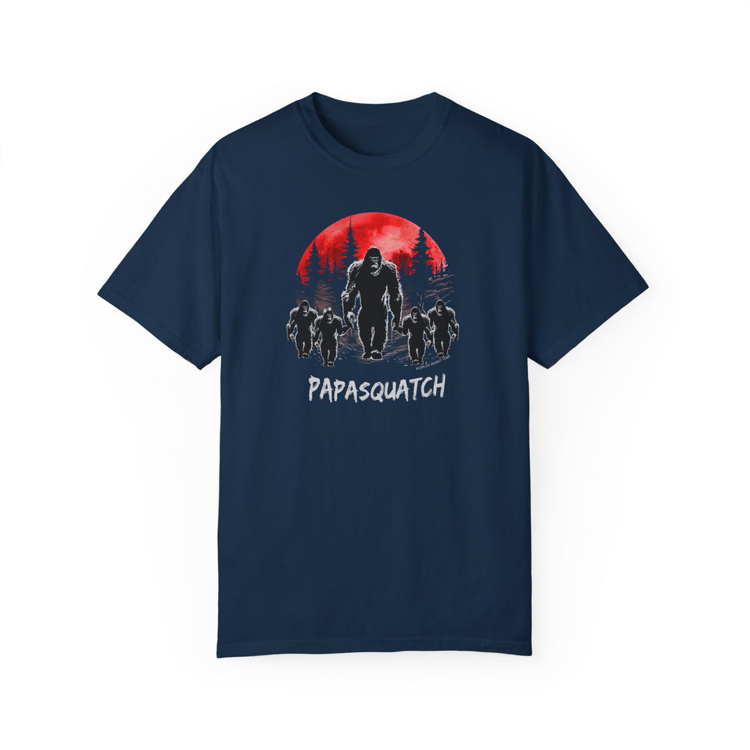 Papasquatch Tee: A blue t-shirt featuring a bigfoot and red moon design. 100% ring-spun cotton, garment-dyed for coziness. Relaxed fit, double-needle stitching for durability, no side-seams for shape retention. Medium weight.