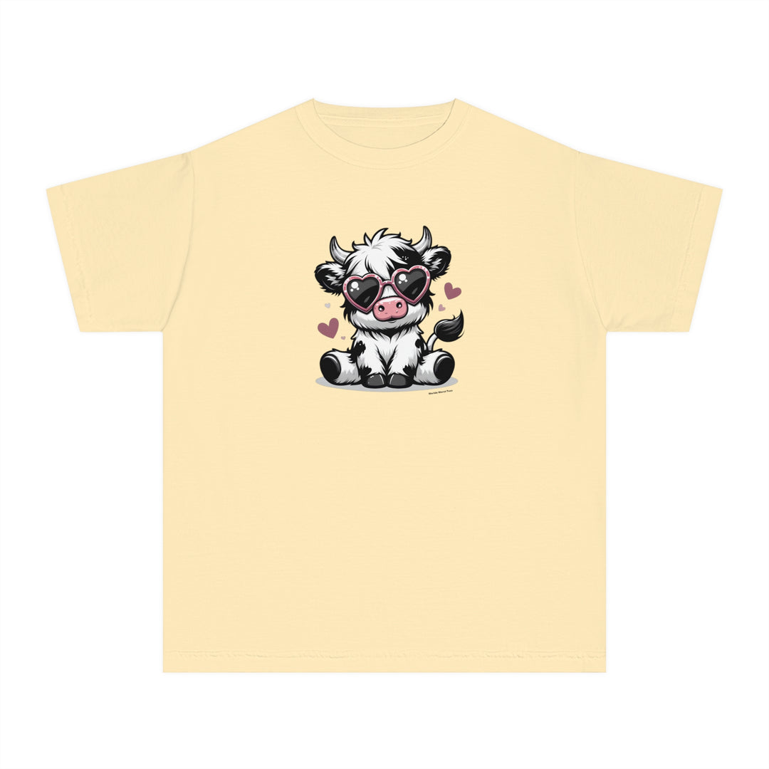 A playful yellow kids tee featuring a cartoon cow with sunglasses. Made of soft 100% combed ringspun cotton for comfort and agility. Perfect for active days.