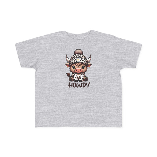 Toddler tee featuring a cartoon cow in a hat, ideal for sensitive skin. 100% combed ringspun cotton, light fabric, tear-away label, classic fit. Sizes: 2T, 3T, 4T, 5-6T. Howdy Toddler Tee by Worlds Worst Tees.