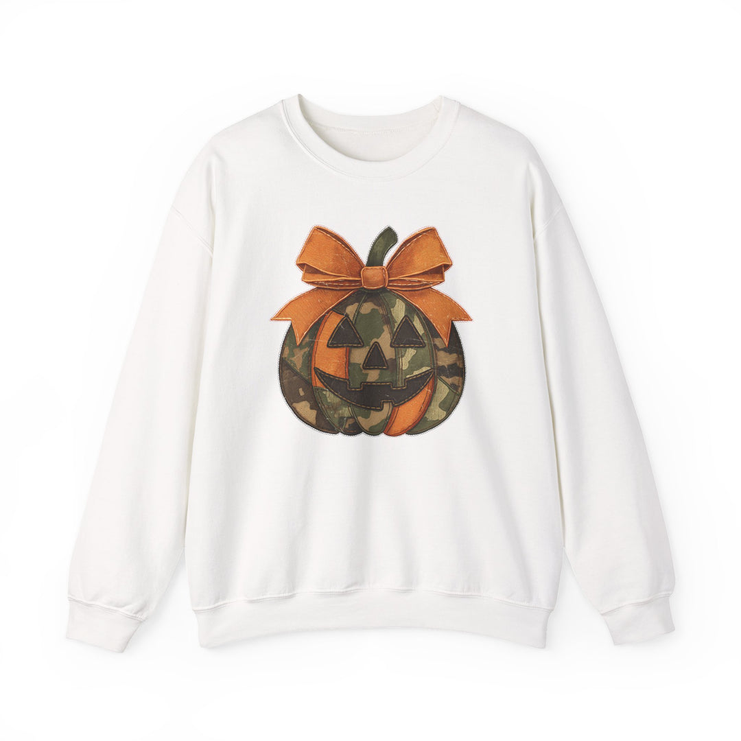 Jackie O Crew sweatshirt featuring a Halloween jack-o’-lantern applique with bright orange and camouflage segments, topped with an orange bow, ideal for cozy, stylish wear.