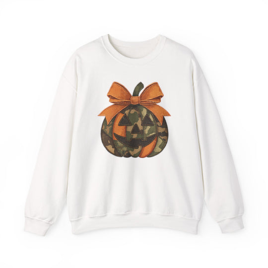 Jackie O Crew sweatshirt featuring a Halloween jack-o’-lantern applique with bright orange and camouflage segments, topped with an orange bow, ideal for cozy, stylish wear.