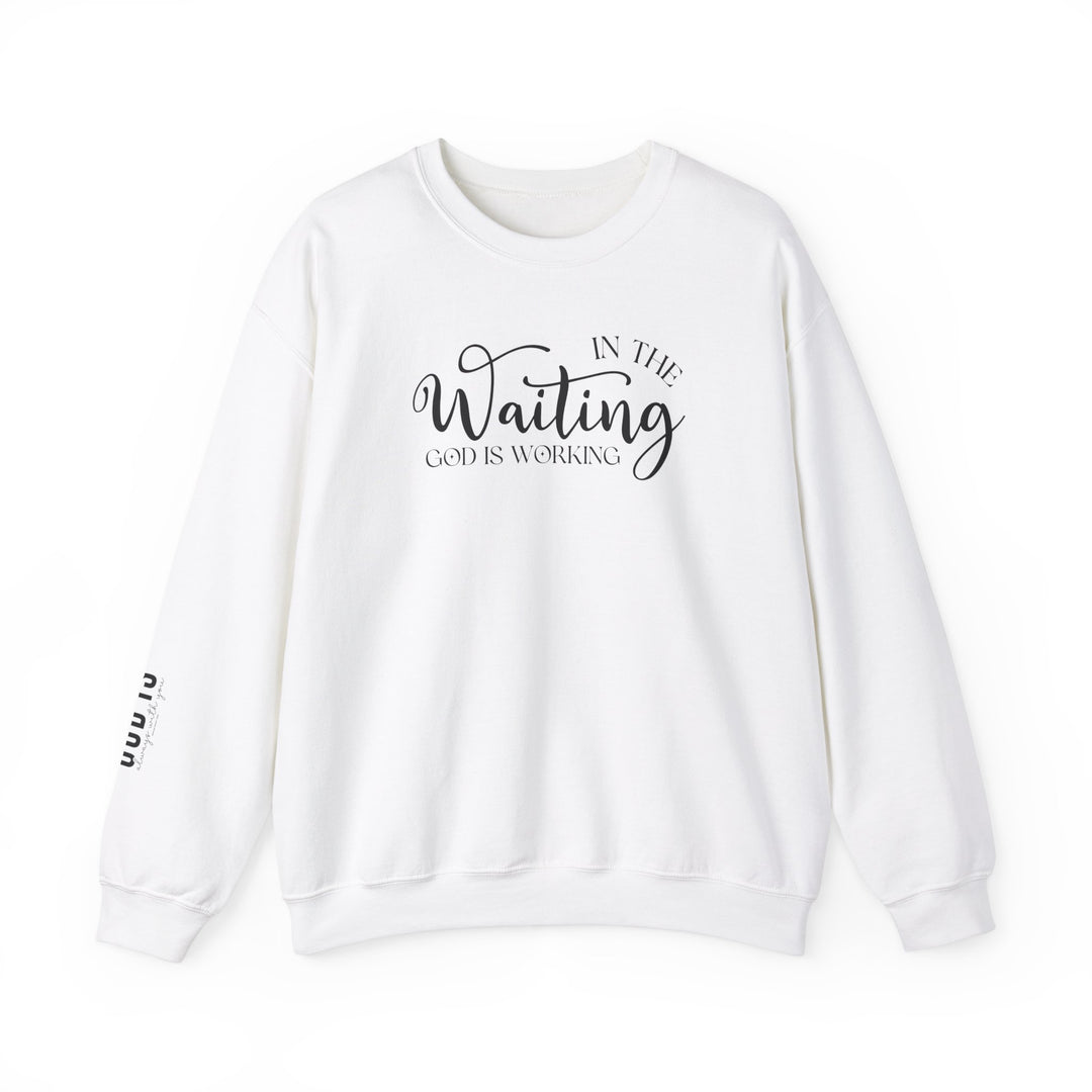 A white crewneck sweatshirt featuring black text, ideal for comfort in any situation. Unisex God is Working Crew made of 50% cotton, 50% polyester, with ribbed knit collar and no itchy side seams.
