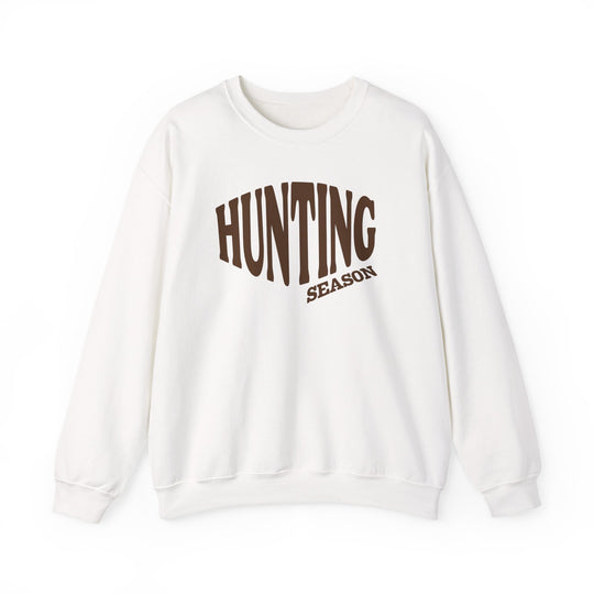 Plain white crewneck sweatshirt with HUNTING SEASON in brown text, featuring ribbed cuffs and hem, offering a cozy, durable fit for cooler months.