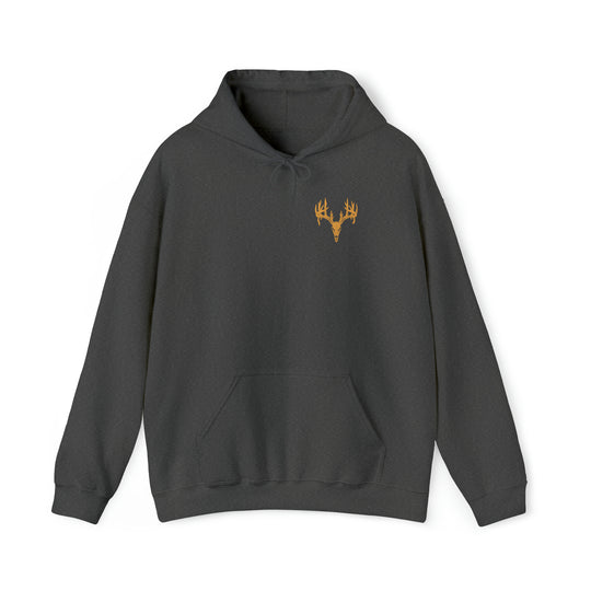 A black Tagged Out Sweatshirt featuring a deer skull design. Unisex heavy blend hooded sweatshirt made of 50% cotton, 50% polyester, with a kangaroo pocket and drawstring hood. Classic fit, tear-away label.