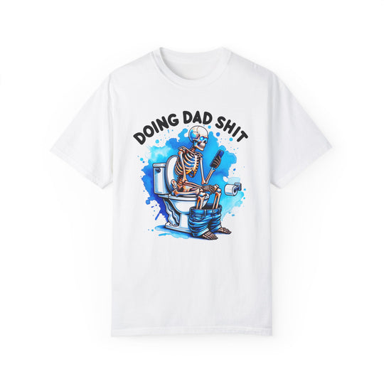 A white t-shirt featuring a skeleton on a toilet, part of the Doing Dad Shit Tee collection by Worlds Worst Tees. Made of 100% ring-spun cotton, with a relaxed fit and double-needle stitching for durability.