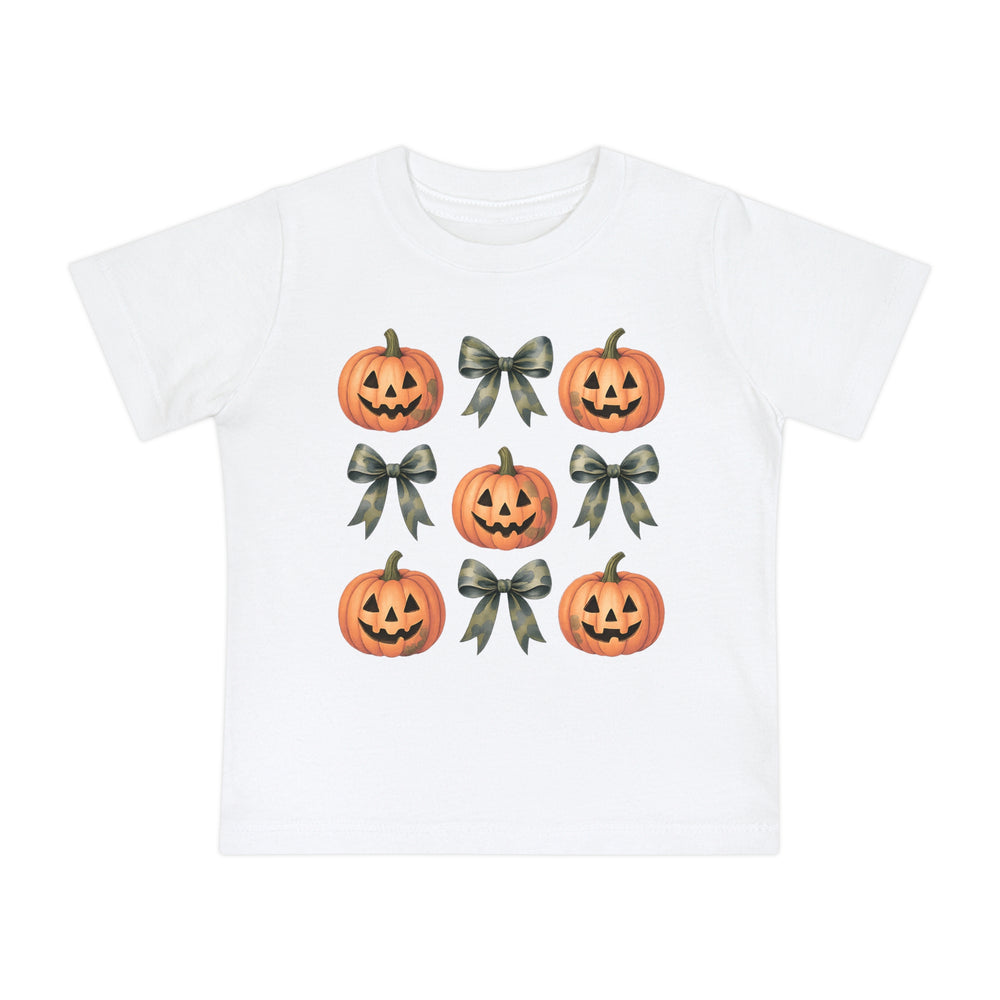 Pumpkins and Bows Baby Tee featuring a 3x3 grid of jack-o’-lanterns and camouflage-pattern bows, emphasizing a soft, durable design for infants.