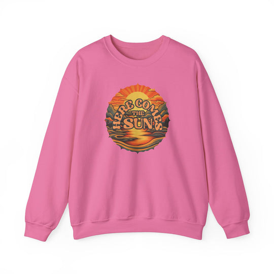A unisex heavy blend crewneck sweatshirt featuring a sun graphic design. Comfortable, ribbed knit collar, no itchy side seams. 50% Cotton 50% Polyester, medium-heavy fabric, loose fit. Here Comes the Sun Crew by Worlds Worst Tees.