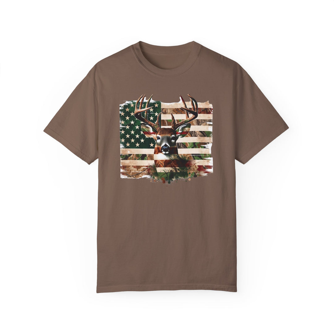 A relaxed fit Deer Flag Tee crafted from 100% ring-spun cotton, featuring a deer head and flag design. Garment-dyed for extra coziness with double-needle stitching for durability. Ideal for daily wear.