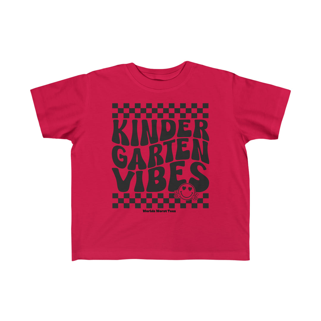 Kindergarten Vibes Toddler Tee featuring red shirt with black text, perfect for sensitive skin. 100% combed ringspun cotton, light fabric, classic fit, tear-away label, true to size. Ideal for first ventures.