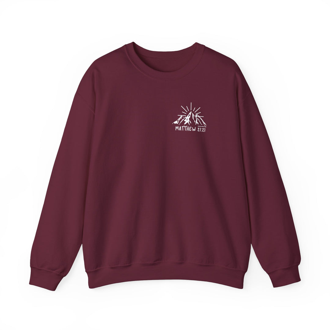 Unisex heavy blend crewneck sweatshirt featuring Faith Can Move Mountains logo. Made of 50% cotton and 50% polyester for comfort and durability. Classic fit with ribbed knit collar, double-needle stitching, and tear-away label.