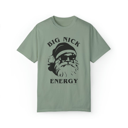 A unisex Big Nick Energy Tee featuring a Santa Claus graphic on a black shirt. Made with 80% ring-spun cotton and 20% polyester, relaxed fit, and rolled-forward shoulder design.