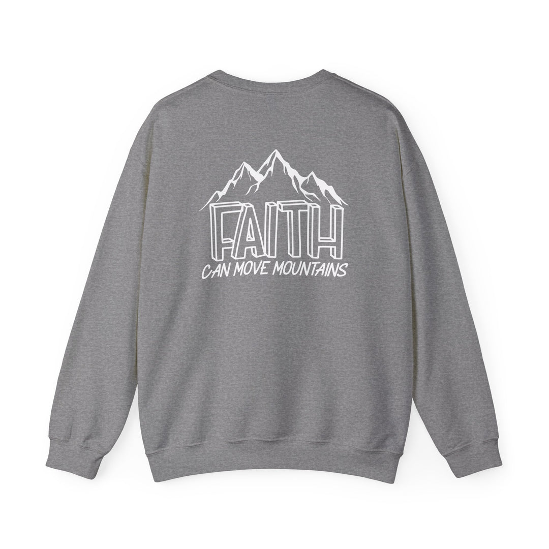 A unisex heavy blend crewneck sweatshirt featuring Faith Can Move Mountains text. Made from 50% cotton and 50% polyester, with ribbed knit collar and durable double-needle stitching. Comfortable and cozy for colder months.
