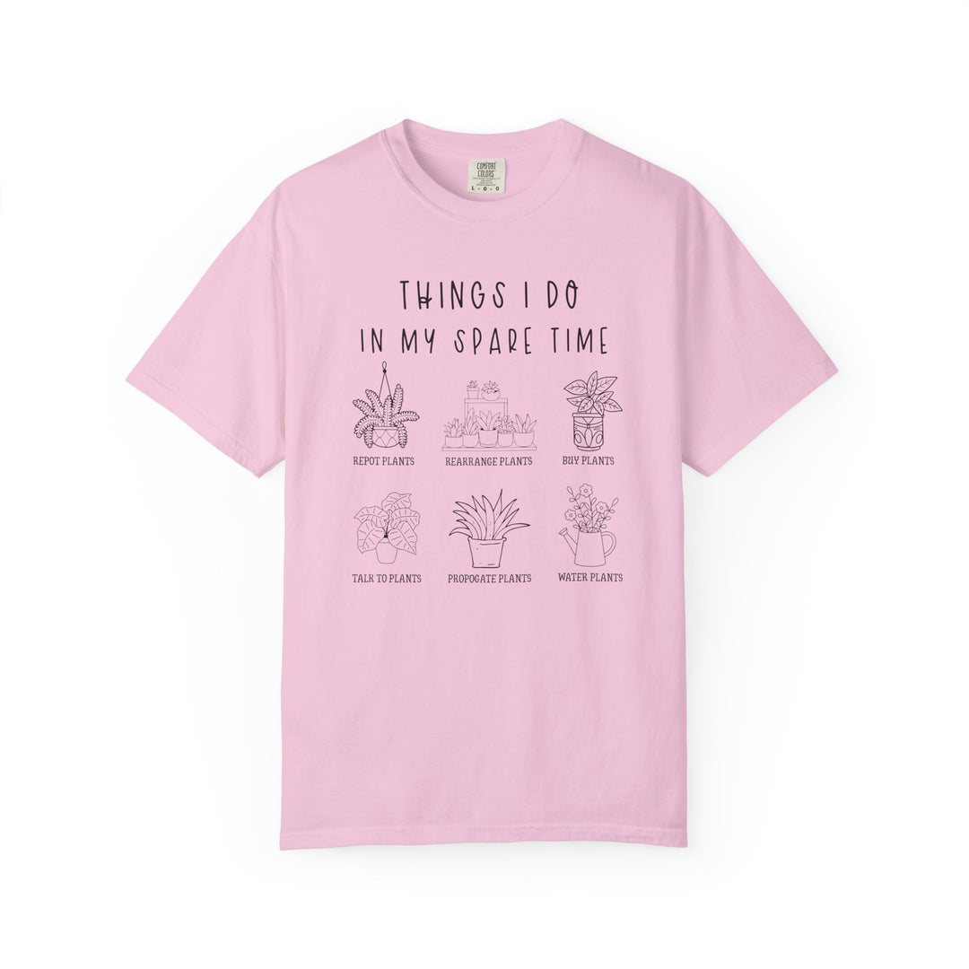 Light-pink Plants Spare Time Tee featuring black plant-lover theme with humorous captions and line-drawings of potted plants. Made from ring-spun cotton for comfort and durability.