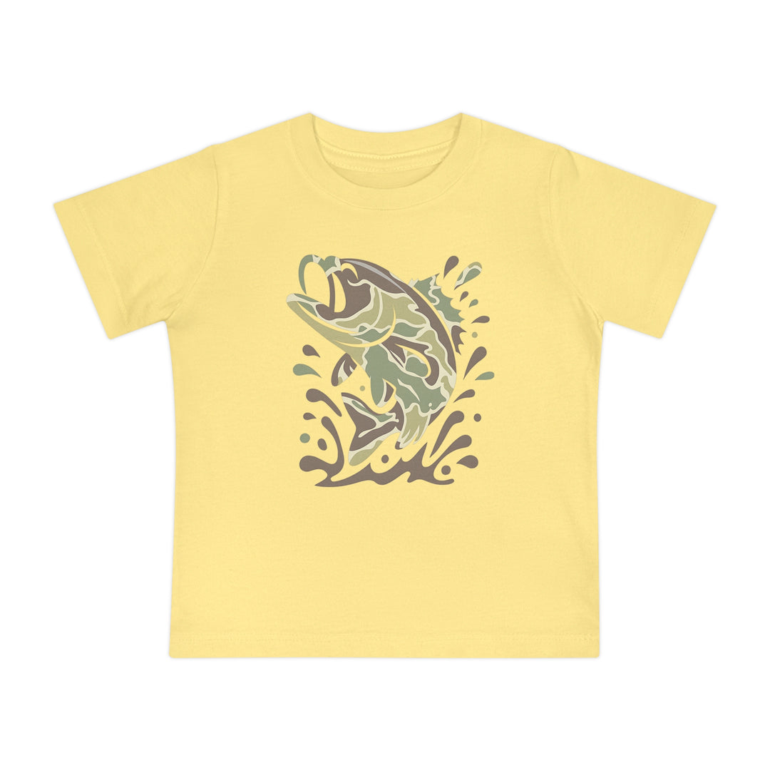 Camo Fish Baby Tee: Pale yellow kids' T-shirt featuring a stylized camo fish graphic leaping with water splash motifs, made from soft, durable cotton for comfort.