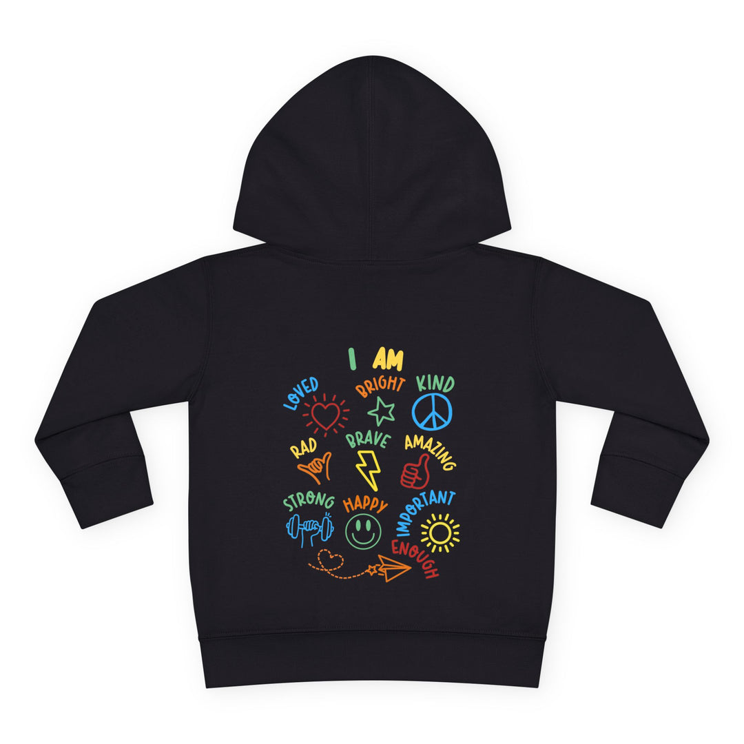 I AM Toddler Hoodie features colorful affirmations on the back, including loved, strong, and happy, with playful icons, offering cozy comfort and durability.
