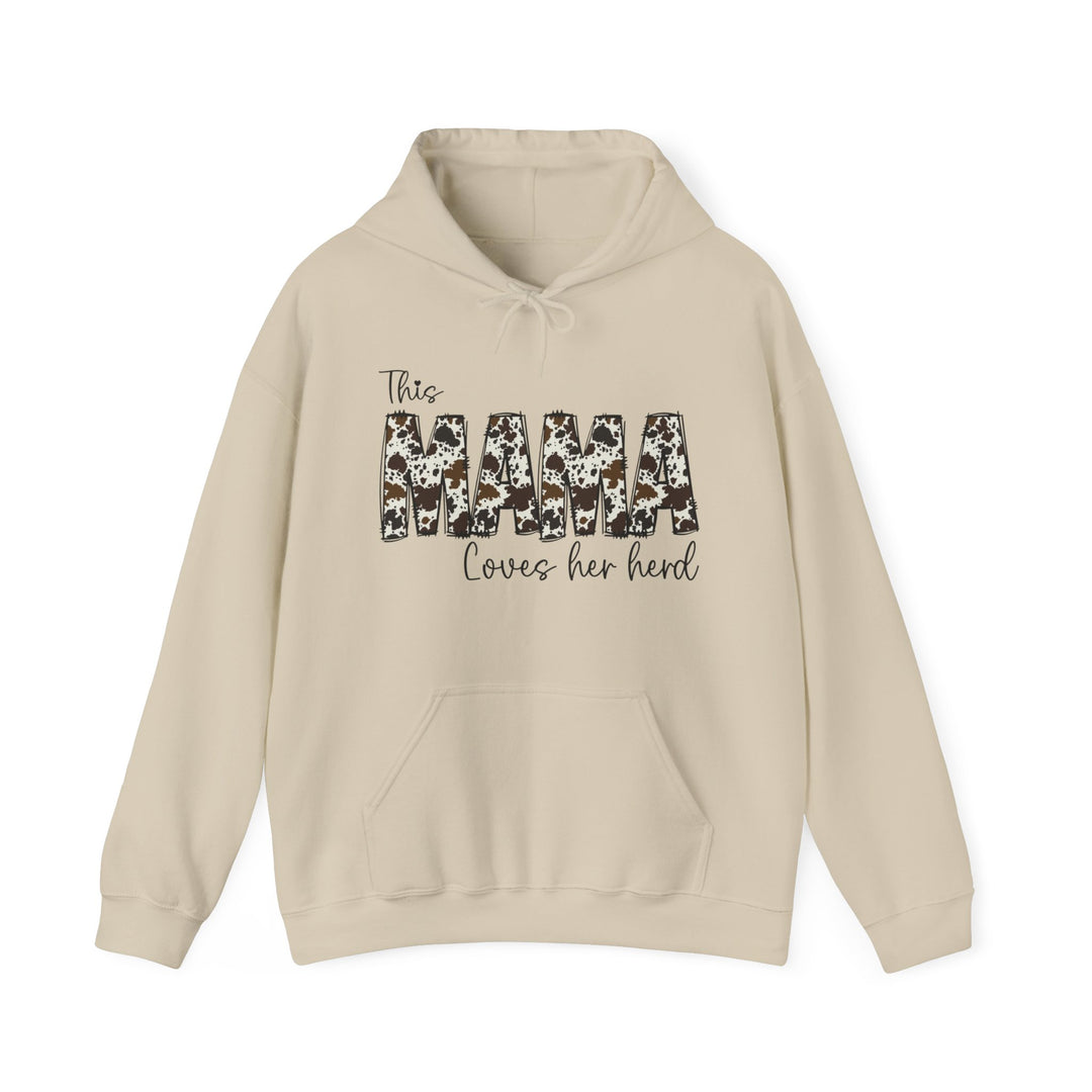 A Mama Herd Hoodie, a beige sweatshirt with cow print, in a classic fit, made of 50% cotton and 50% polyester blend fabric. Features a kangaroo pocket and drawstring hood. From Worlds Worst Tees.