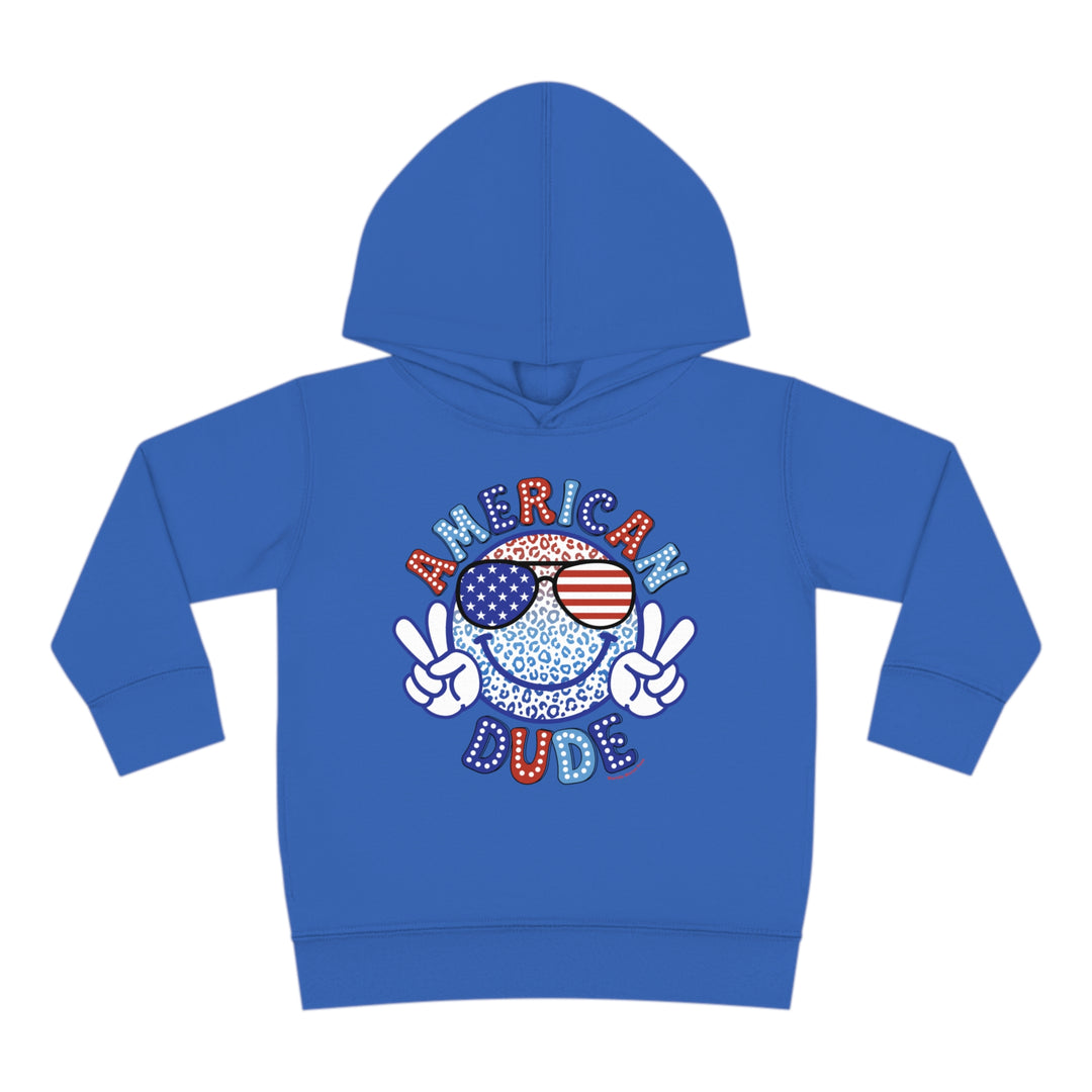 American Dude Toddler Hoodie featuring a smiley face and peace sign, designed for comfort and durability with jersey-lined hood, cover-stitched details, and side seam pockets. Ideal for cozy playtime.