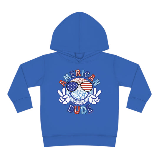 American Dude Toddler Hoodie featuring a smiley face and peace sign, designed for comfort and durability with jersey-lined hood, cover-stitched details, and side seam pockets. Ideal for cozy playtime.