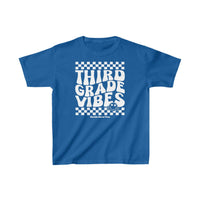 A classic fit kids tee, ideal for everyday wear, made of 100% cotton with twill tape shoulders for durability. Features a tear-away label and seamless sides. Product title: 3rd Grade Vibes Kids Tee.