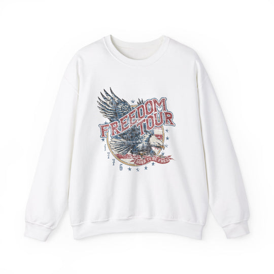 A white crewneck sweatshirt with a graphic design featuring a bird and a flag, embodying American Freedom Crew. Made of 50% cotton and 50% polyester, with ribbed knit collar and no itchy side seams.