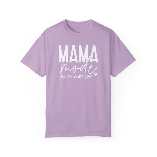 A relaxed fit Mama Mode Tee, garment-dyed in purple with white text. 100% ring-spun cotton, soft-washed for coziness. Durable double-needle stitching, no side-seams for a tubular shape.
