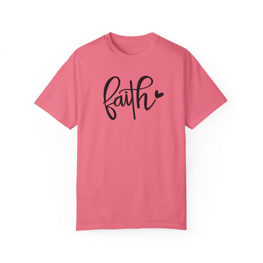 Relaxed fit Faith Tee in pink with black text. 100% ring-spun cotton, garment-dyed for extra coziness. Double-needle stitching for durability, no side-seams for shape retention. Medium weight, tubular shape.