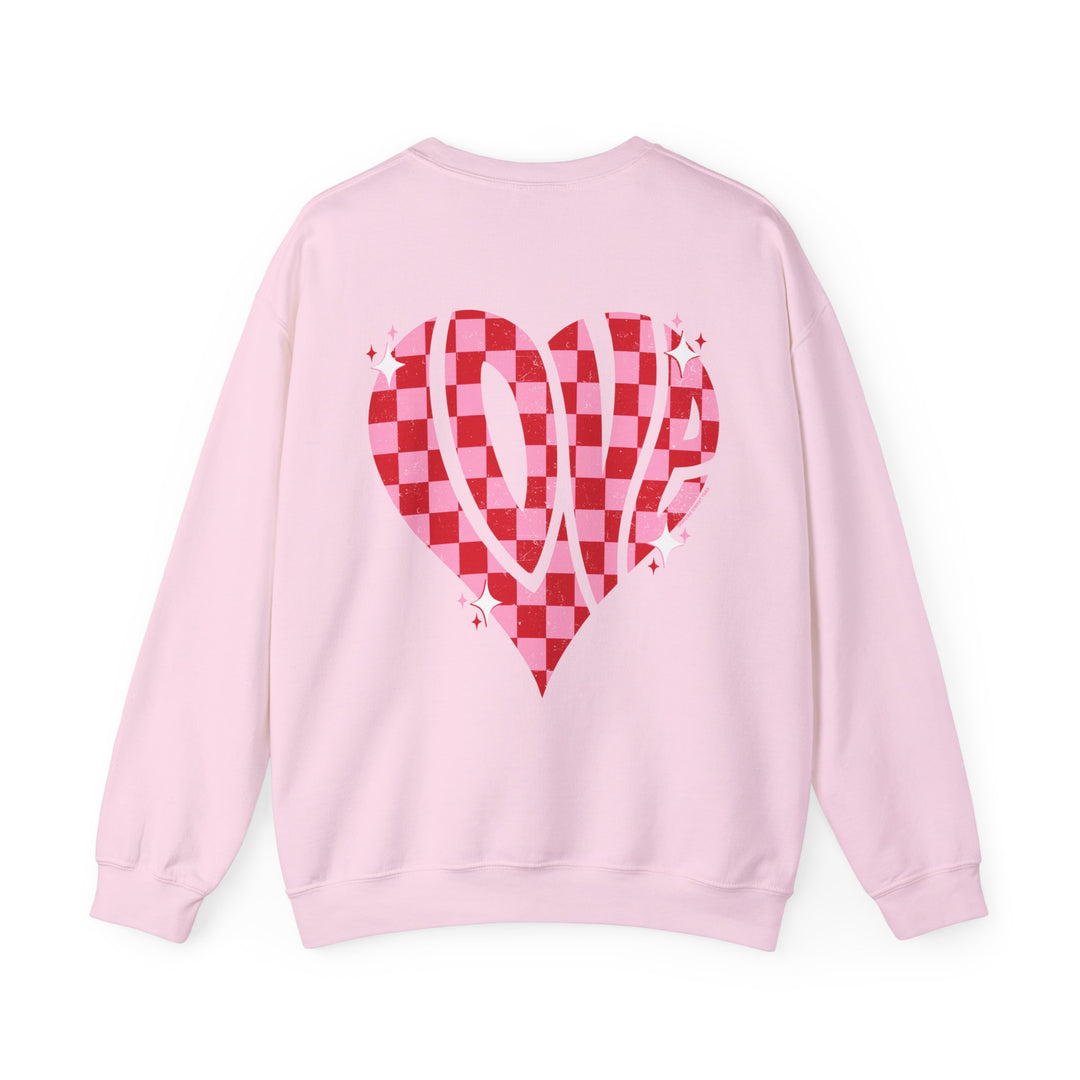 Unisex Love Crew sweatshirt: Pink sweater with heart design. Cotton-polyester blend for comfort. Ribbed knit collar, no itchy seams. Medium-heavy fabric, loose fit, sewn-in label. Sizes S-5XL.