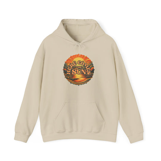 A white hoodie with a sun and text design, a cozy blend of cotton and polyester, featuring a kangaroo pocket and drawstring hood. Title: Here Comes the Sun Hoodie.