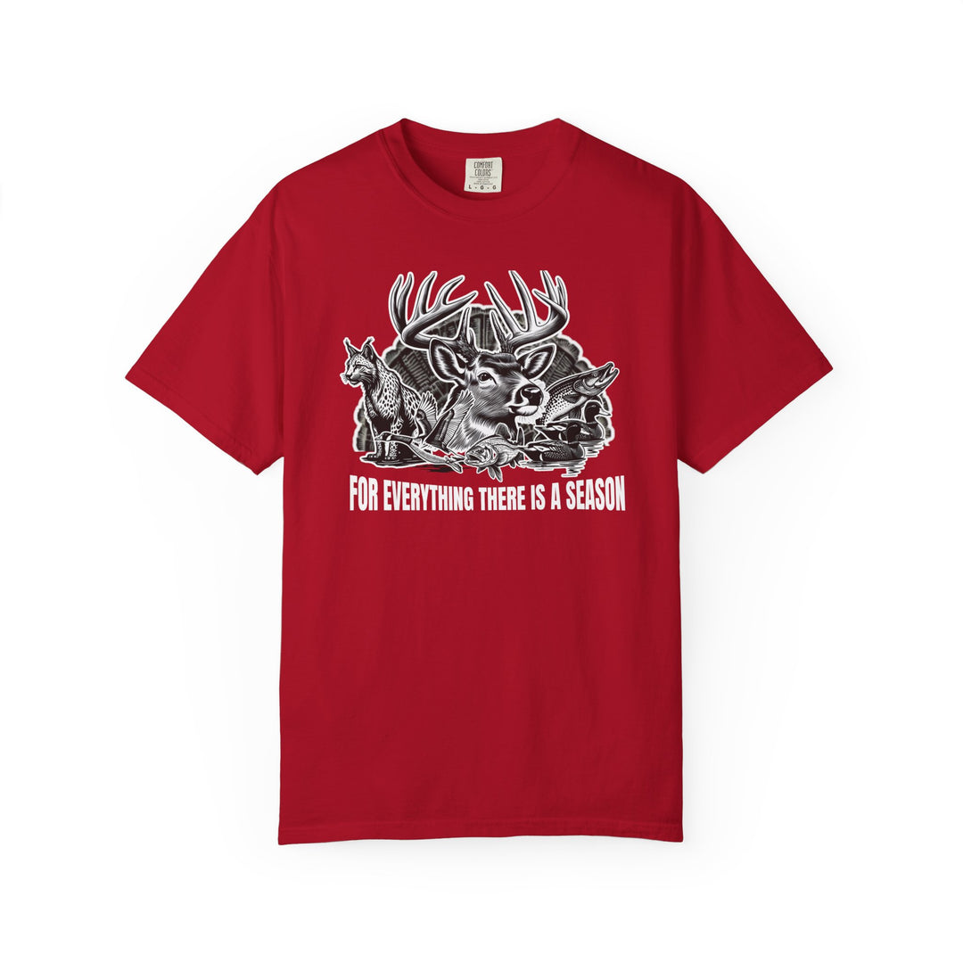 For Everything There is a Season Tee featuring a wildlife montage with a deer, fox, fish, ducks, and crossed arrows; a durable, soft-washed Comfort Colors shirt.