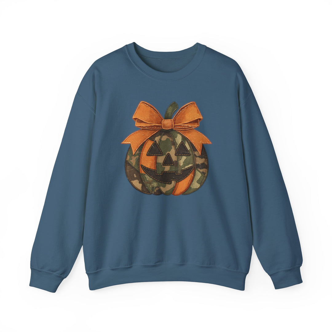 Steel-blue Jackie O Crew sweatshirt featuring a large jack-o-lantern graphic with orange and camouflage panels, topped with an orange bow, ideal for cozy comfort.