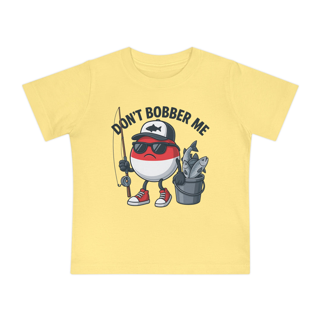 Copy of Don't Bobber Me Baby Tee featuring a cartoon fishing bobber character with a fly-rod and bucket, offering a humorous design for infant style and comfort.