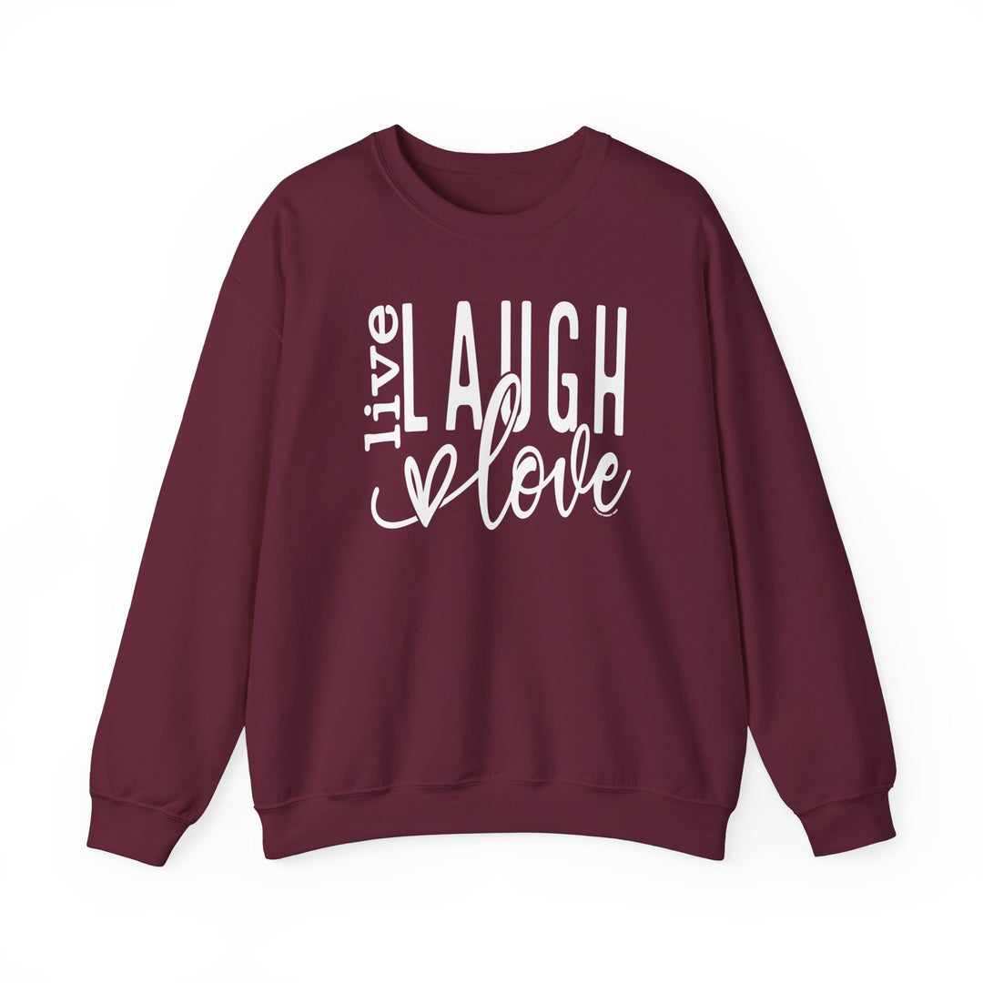 A maroon crewneck sweatshirt with white text, ideal for comfort in any situation. Made of 50% cotton and 50% polyester, featuring ribbed knit collar and no itchy side seams. From Worlds Worst Tees, Live Laugh Love Crew.