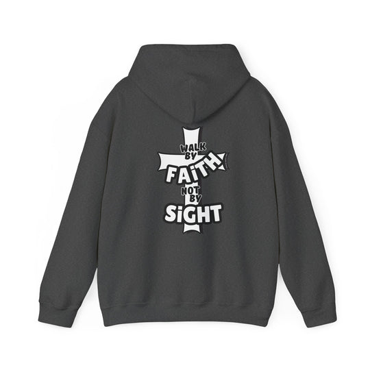 A grey hoodie featuring Walk By Faith Not By Sight text, a kangaroo pocket, and drawstring hood. Unisex heavy blend sweatshirt made of 50% cotton, 50% polyester, with no side seams. Ideal for warmth and comfort.