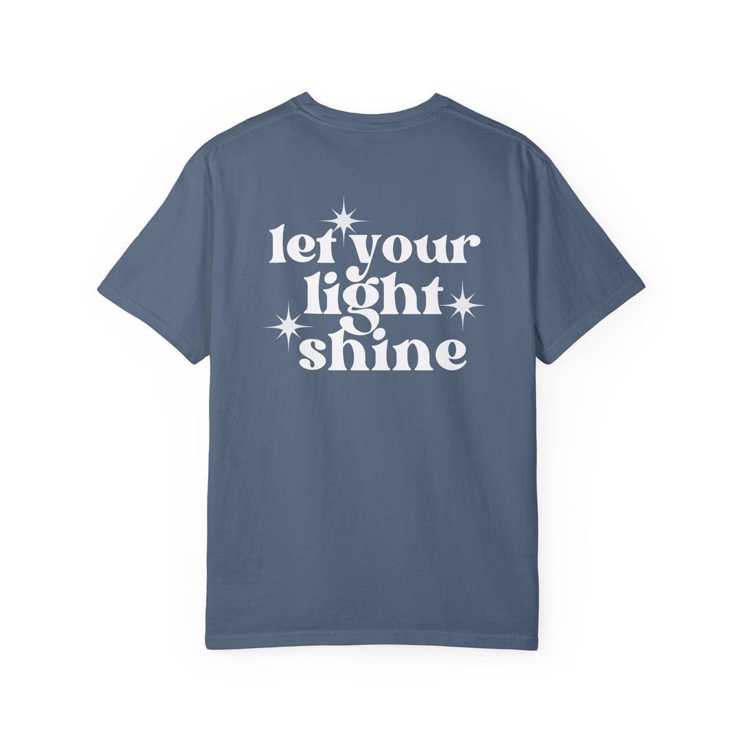 Relaxed fit Let Your Light Shine Tee, back view, blue shirt with white text and star. 100% ring-spun cotton, soft-washed, durable double-needle stitching, seamless design for comfort.