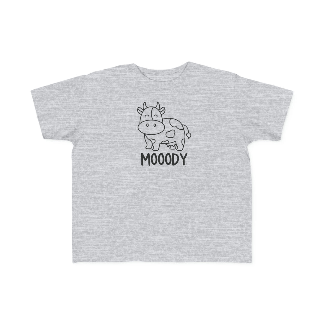 Moody Toddler Tee featuring a cow print on grey fabric. Soft and durable for sensitive skin, made of 100% combed ringspun cotton, light fabric, classic fit, tear-away label, and true to size.