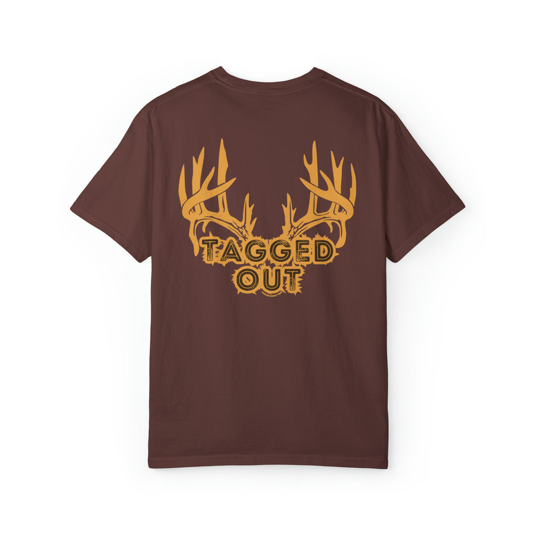 A brown shirt with antlers and text, the Tagged Out Tee by Worlds Worst Tees. Unisex sweatshirt, 80% ring-spun cotton, 20% polyester, relaxed fit, rolled-forward shoulder, back neck patch.