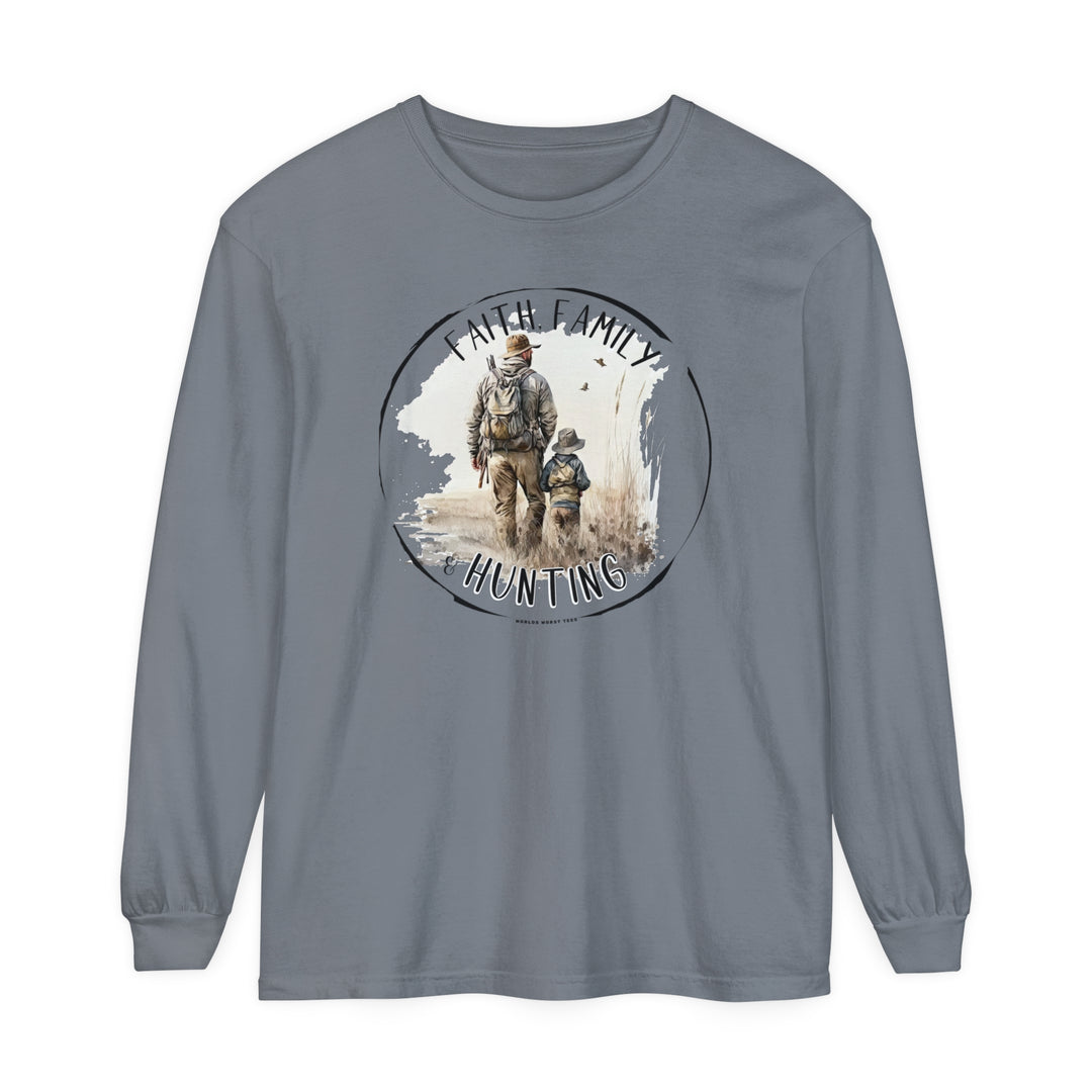 A Faith Family Hunting Long Sleeve T-Shirt in grey, featuring a man and child walking in a field. Made of 100% ring-spun cotton for softness and style, with a classic fit and garment-dyed fabric. Ideal for casual comfort.