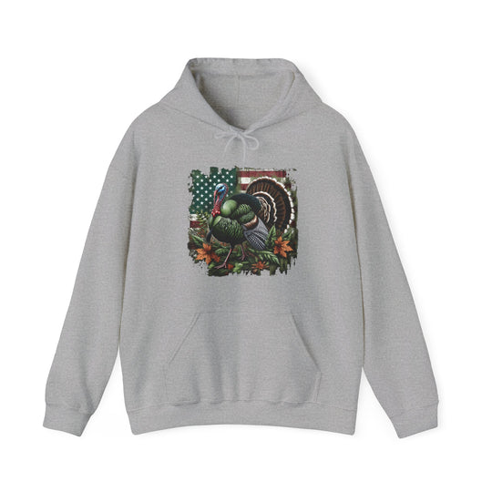 Turkey Hunting Hoodie: Grey sweatshirt featuring a turkey design, ideal for relaxation. Cotton-polyester blend, kangaroo pocket, and drawstring hood. Medium-heavy fabric, tear-away label, classic fit. Sizes from S to 5XL.