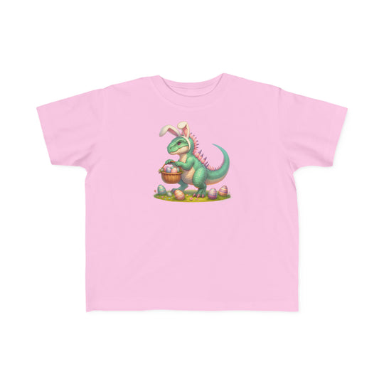 Eggosaurus Toddler Tee featuring a cartoon dinosaur holding a basket of eggs. Soft, durable 100% combed ringspun cotton, light fabric, classic fit, tear-away label, perfect for sensitive skin.