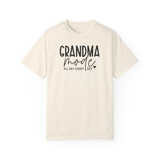 A Grandma Mode Tee, a white t-shirt with black text. 100% ring-spun cotton, garment-dyed for coziness. Relaxed fit, durable double-needle stitching, no side-seams for tubular shape. Ideal for daily wear.