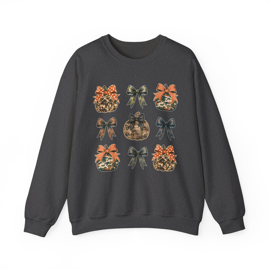 Charcoal-gray crewneck sweatshirt featuring a 3×3 grid of camo and leopard-print pumpkins with decorative bows, combining fall and Halloween themes in a cozy, durable design.