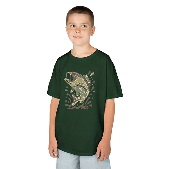 Young boy models the Camo Fish Kids Tee, featuring a camo-patterned fish graphic on a dark green T-shirt, paired with light-wash denim shorts.